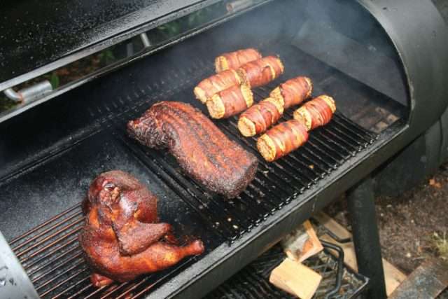Offset smoker set up with sides cooking closest to the firebox
