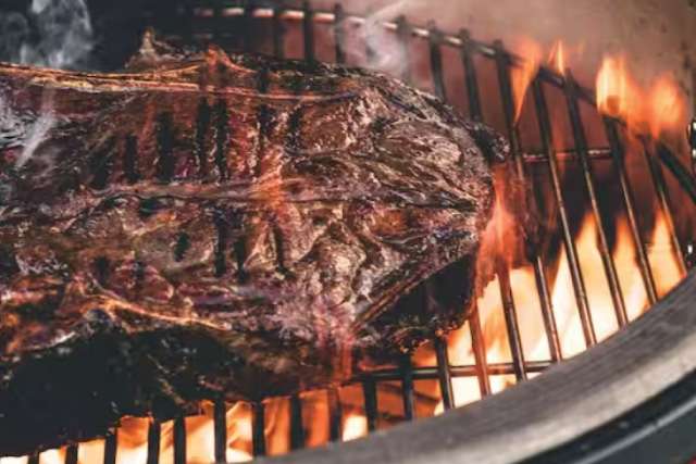 Grilling a steak on the Kamado Joe Classic II