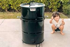 Burning Brisket kid with Pit Barrel Cooker