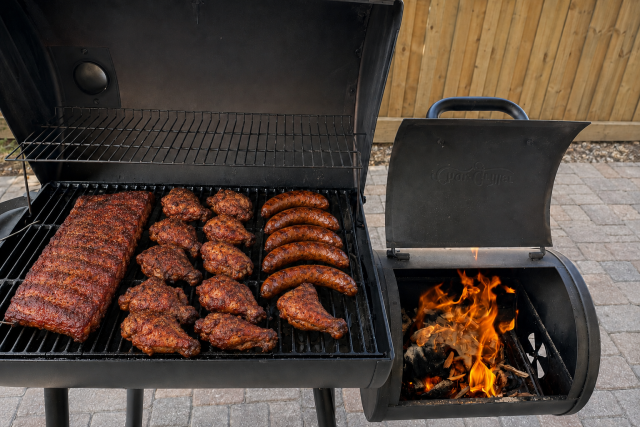 Char Griller Smokin Pro smoking ribs chicken and sausges
